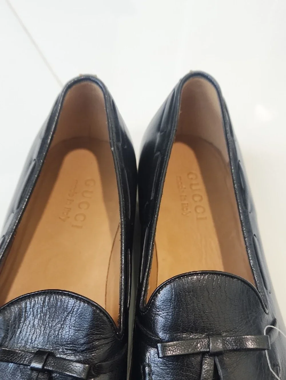 Gucci Black Leather Tassel Loafers with Gold Cat Accent